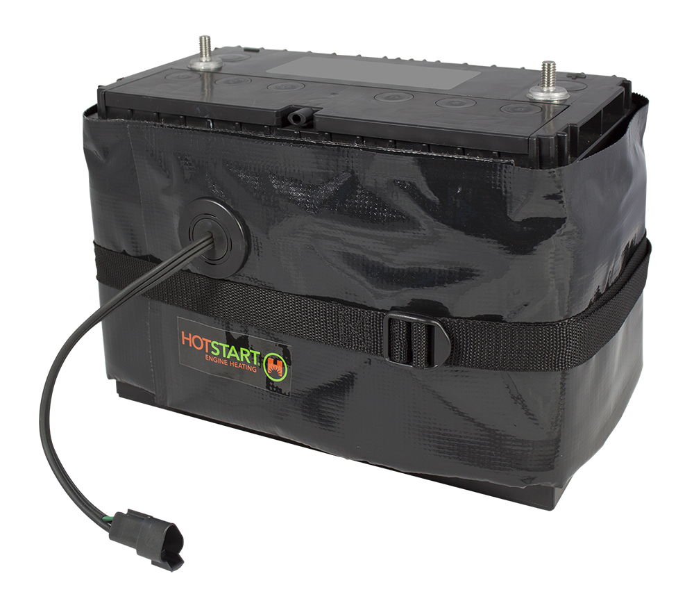Large rectangular battery with a thermal blanket heater wrapped around the box secured by a nylon strap
